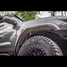 View up under the passenger side fender showing the aluminum fender liners included with the C4 High Clearance Fender Liner kit.
