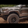 Wider view of the C4 Oversized Tire Fitment Kit installed on a 3rd Gen Tacoma.