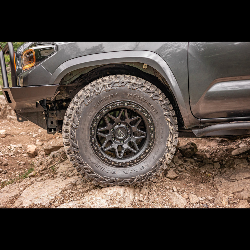 Side view of the High Clearance Fender Liner kit showing the resulting trimmed fender and clearance sufficient to fit a 35" tire.