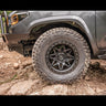 Installed OTF kit showing the clearance afforded 35" tires.