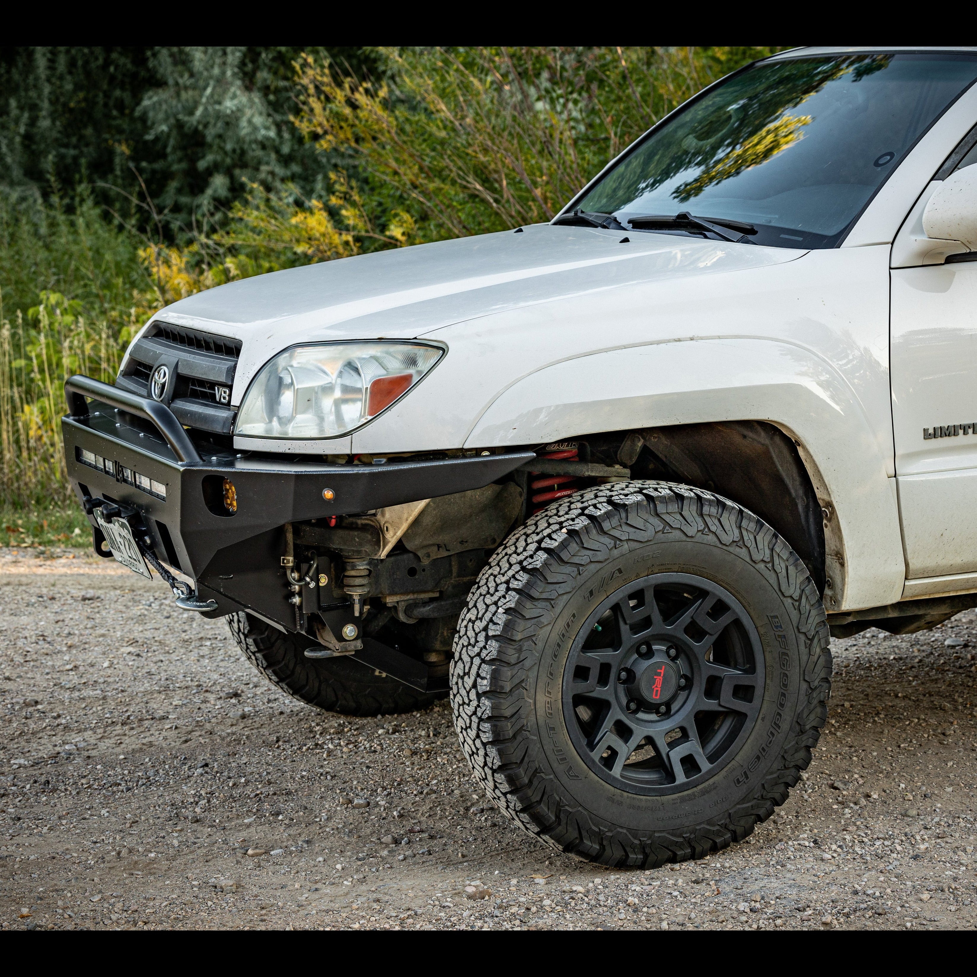 Quartering side view of a 4th Gen 4Runner with a C4 winch bumper equipped.
