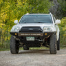 Slightly angled front view showing the C4 Overland winch bumper with low bull bar for the early 4th Generation Toyota 4Runner.