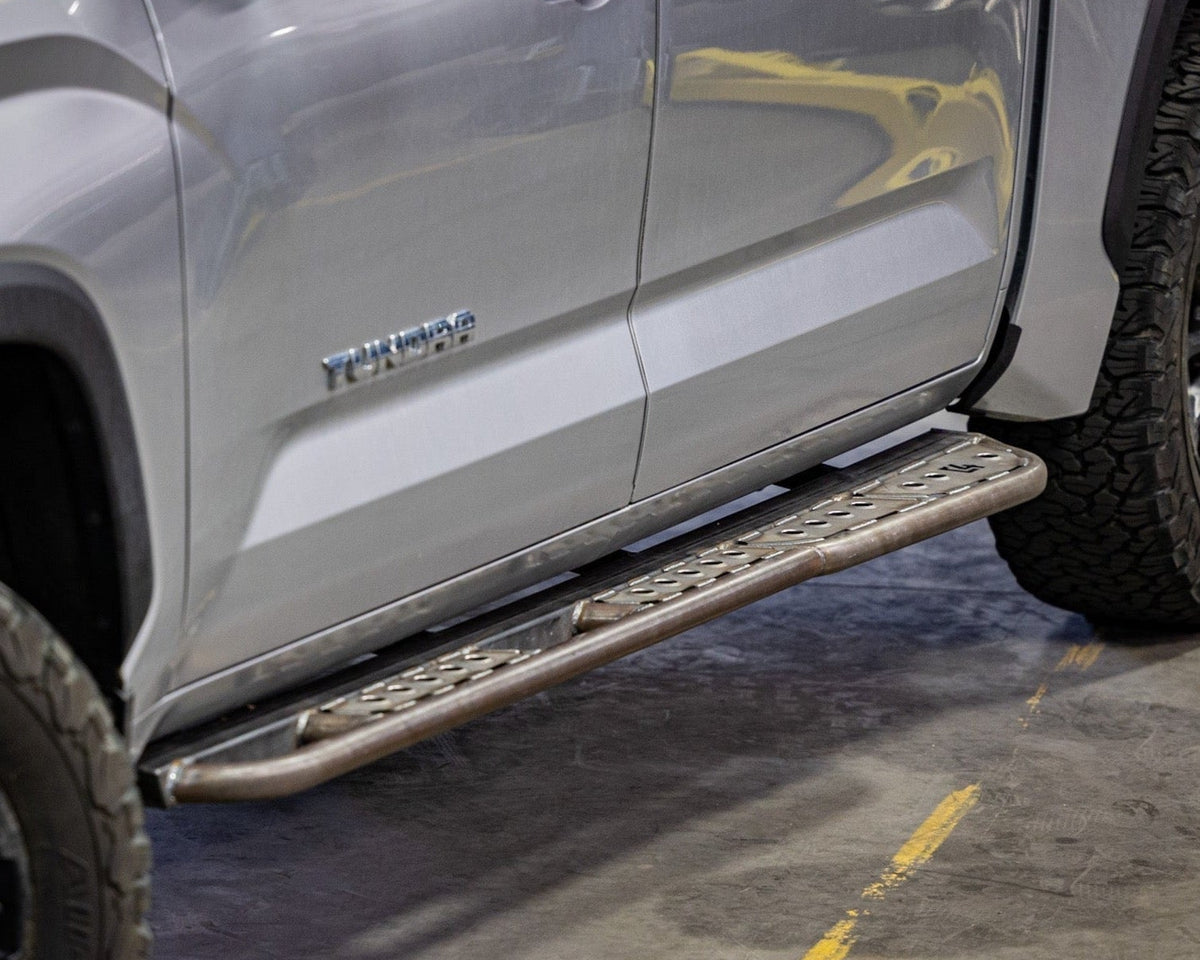 Cover photo of the C4 Sliders for the 3rd Generation Tundra with the background faded out and the sliders and truck emphasized. 
