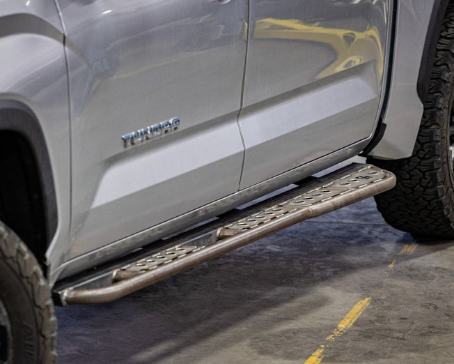 2022 Tundra Rock Sliders equipped on a silver CrewMax.