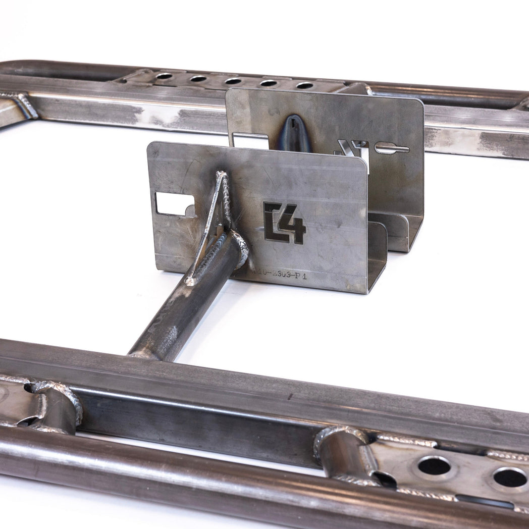 Close-up showing the bolt-on brackets for the C4 Tundra sliders.
