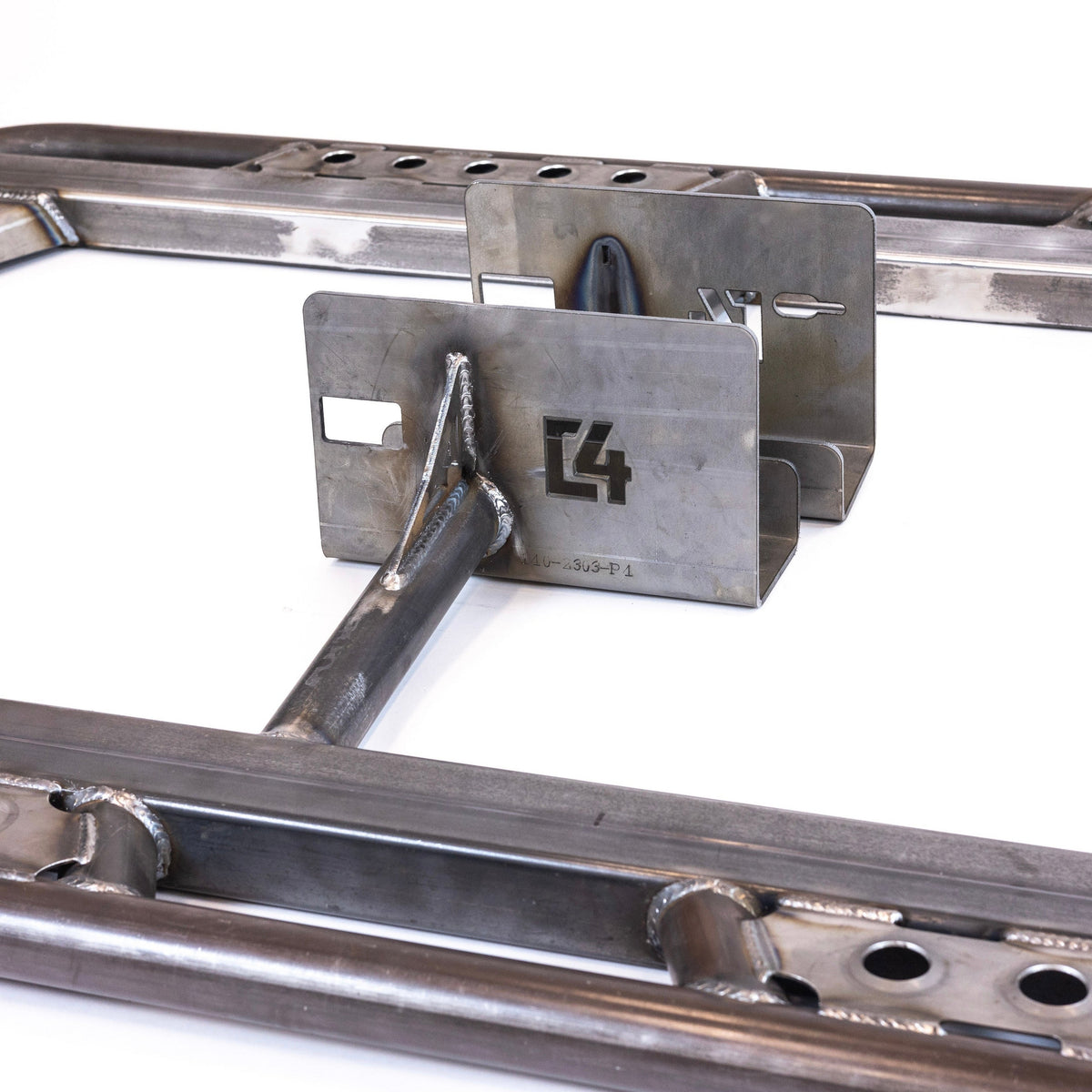 Close-up showing the bolt-on brackets for the C4 Tundra sliders.
