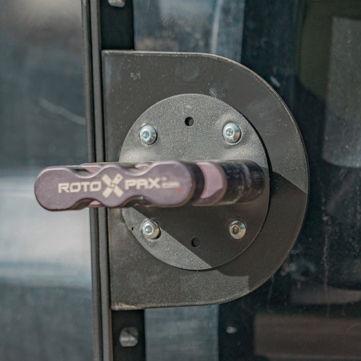 Close-up view of the C4 mount equipped with a RotopaX brand pack mount, an available accessory for the Summit hatch ladder. 