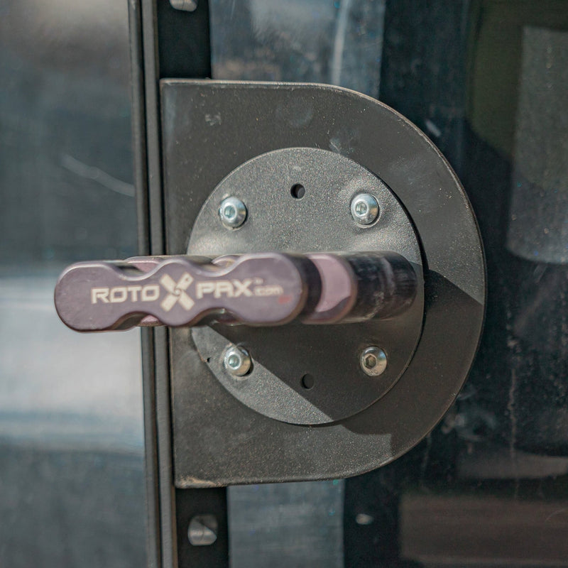 Close-up view of the C4 mount equipped with a RotopaX brand pack mount, an available accessory for the Summit hatch ladder. 