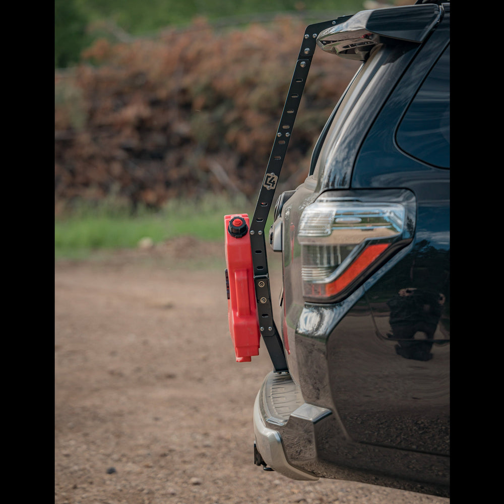 Perfect side view of a C4 Summit hatch ladder with a RotopaX mounted to it, showing the tight fitment. 