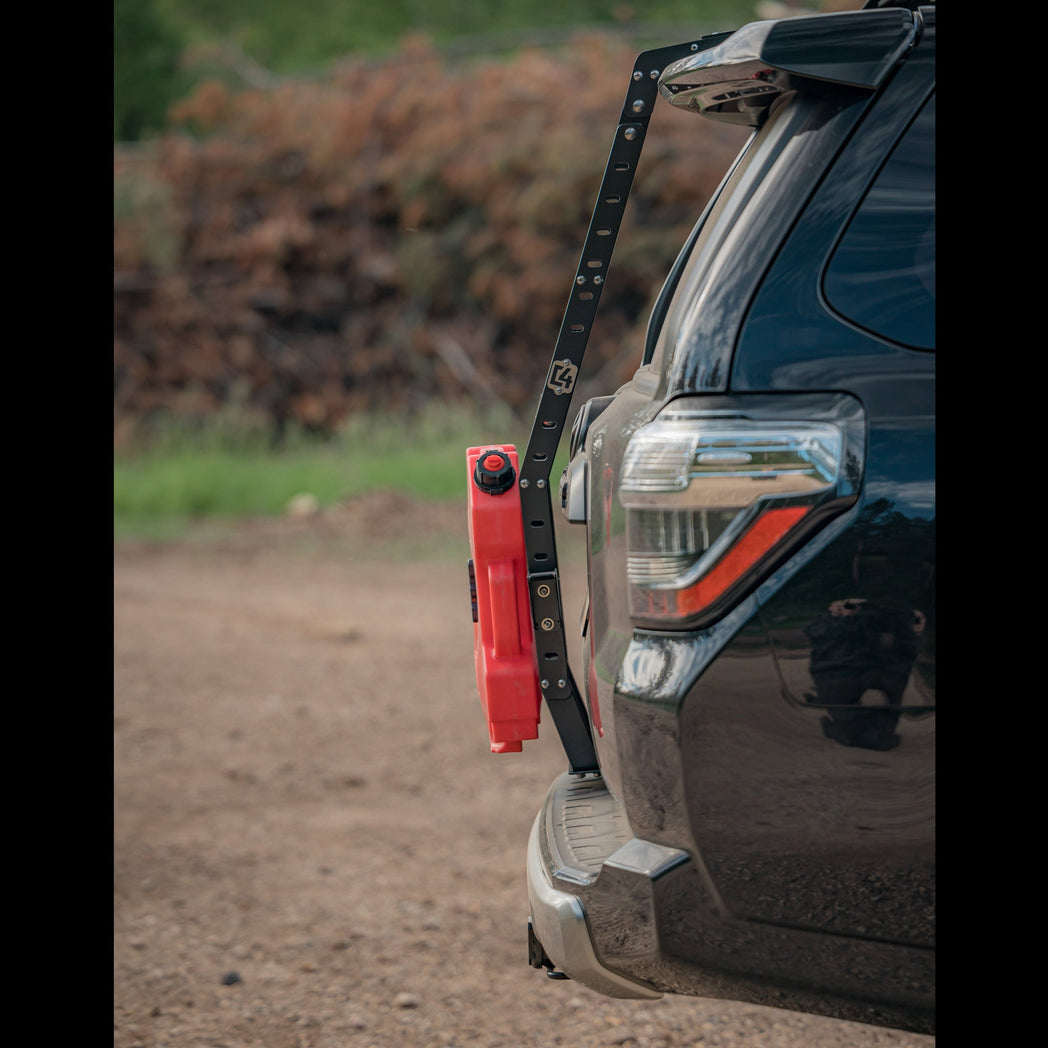 Perfect side view of a C4 Summit hatch ladder with a RotopaX mounted to it, showing the tight fitment. 