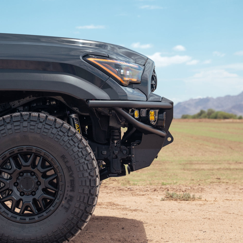 Close up side view of black Toyota 4runner with the C4 6th Gen 4Runner Hybrid Front Bumper installed