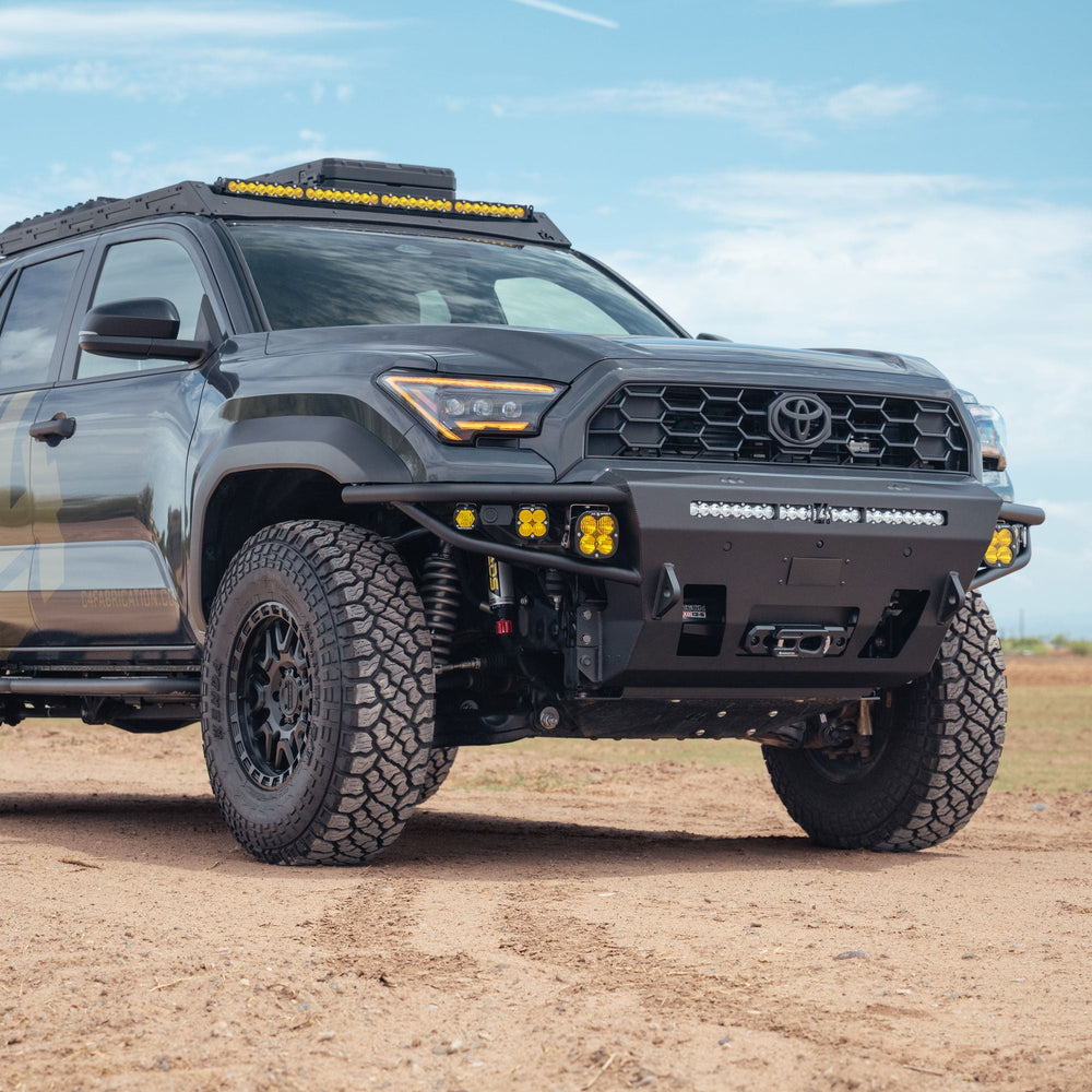 Toyota 4runner with the 6th Gen 4Runner Hybrid Front Bumper installed, parked on a dirt road