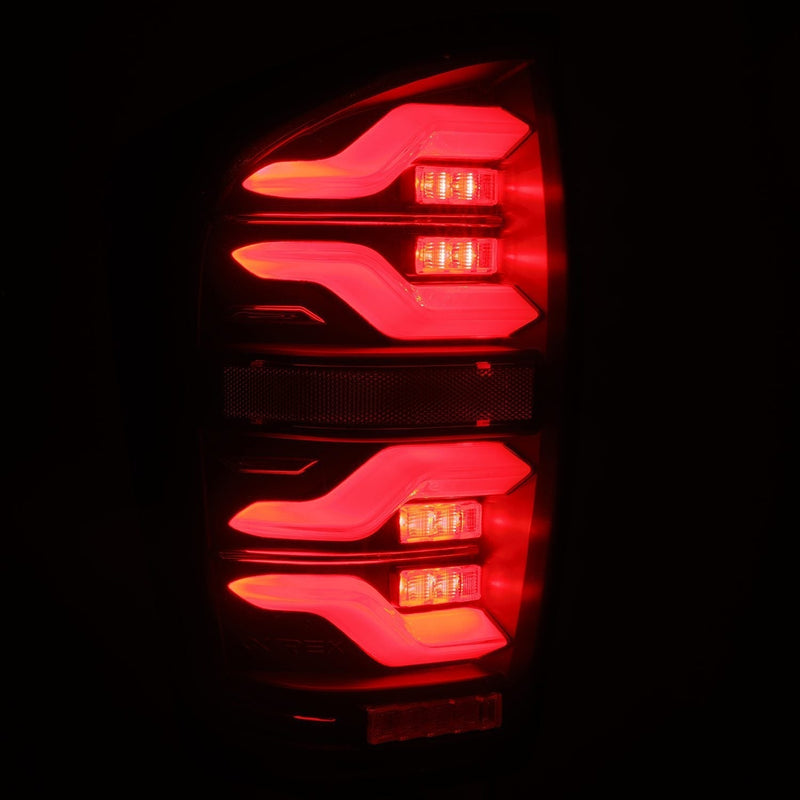 16-23 Toyota Tacoma LUXX-Series LED Tail Lights Black | AlphaRex