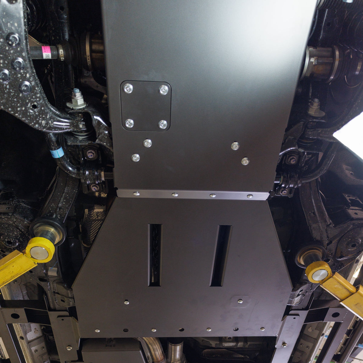Cover photo of the C4 rear skid for the LC250 with the skid emphasized and everything else faded out.