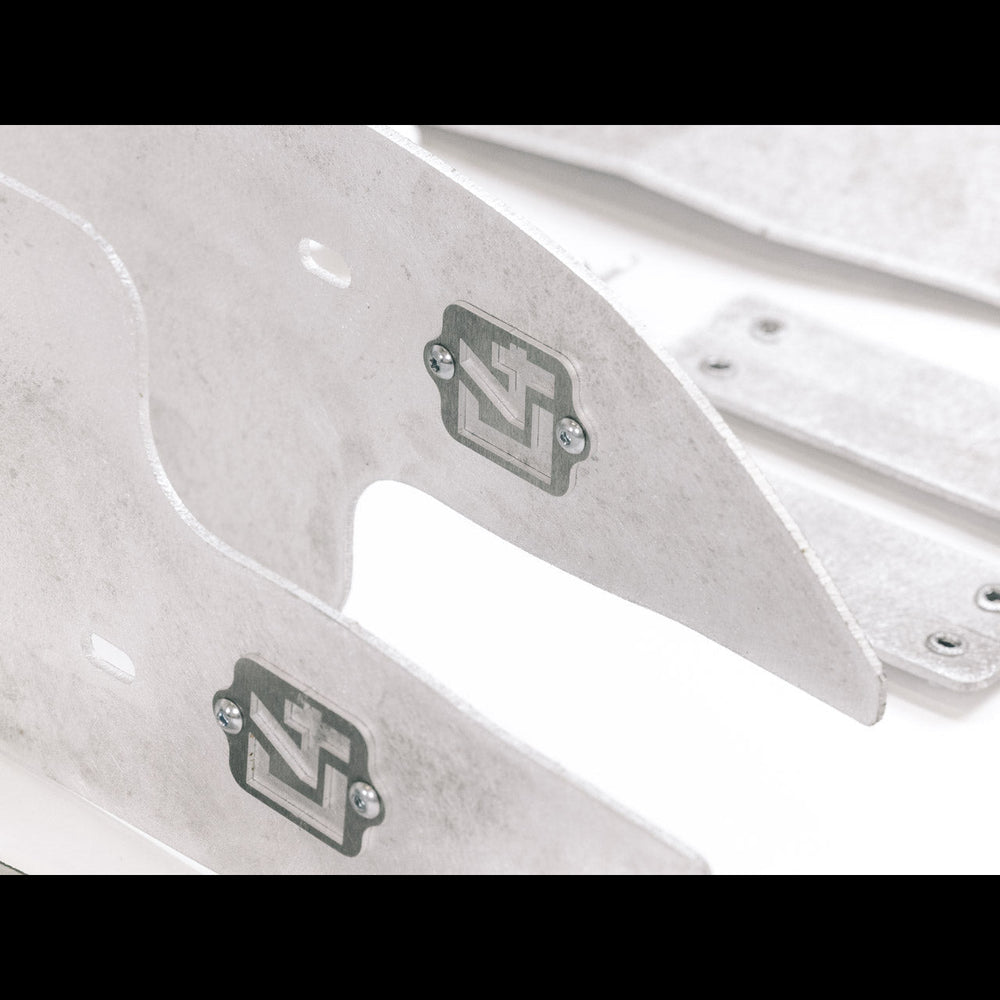 Close up of the C4 logo on the High Clearance Fender Liner kit.