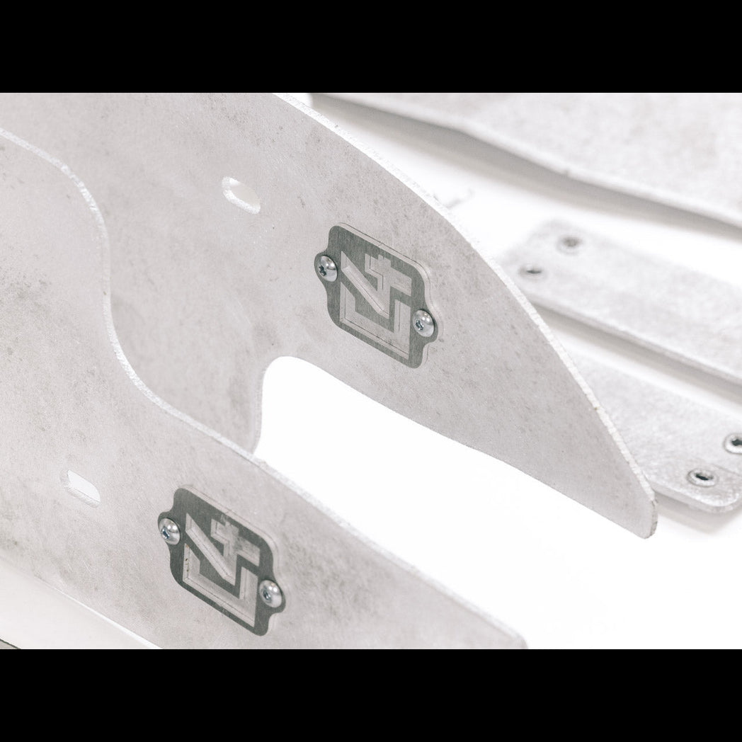 Close up of the C4 logo on the High Clearance Fender Liner kit.