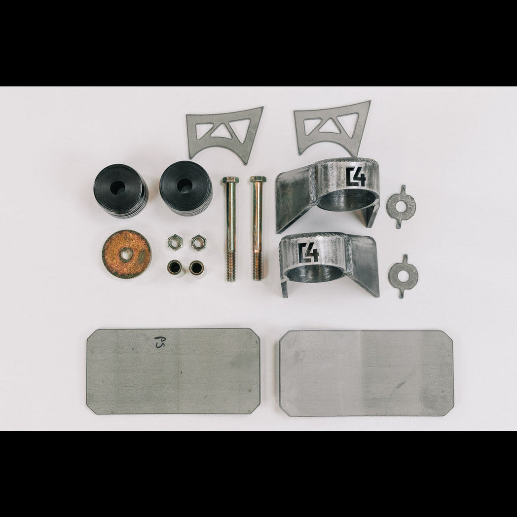 Contents of the Body Mount Relocation kit laid out on a white table.