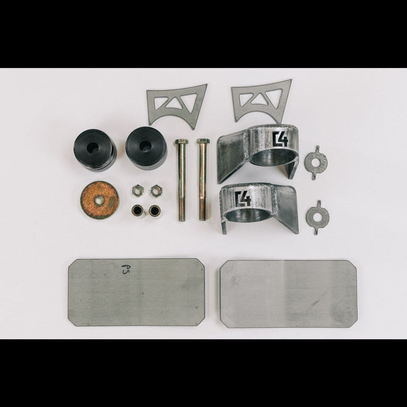 Contents of the Body Mount Relocation kit laid out on a white table.