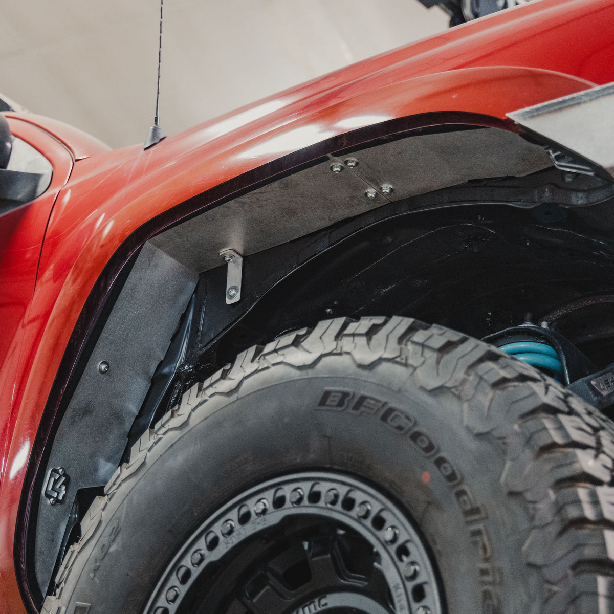 Cover photo of the C4 Fabrication High Clearance Fender Liner kit with emphasis on the liners and everything else faded out.