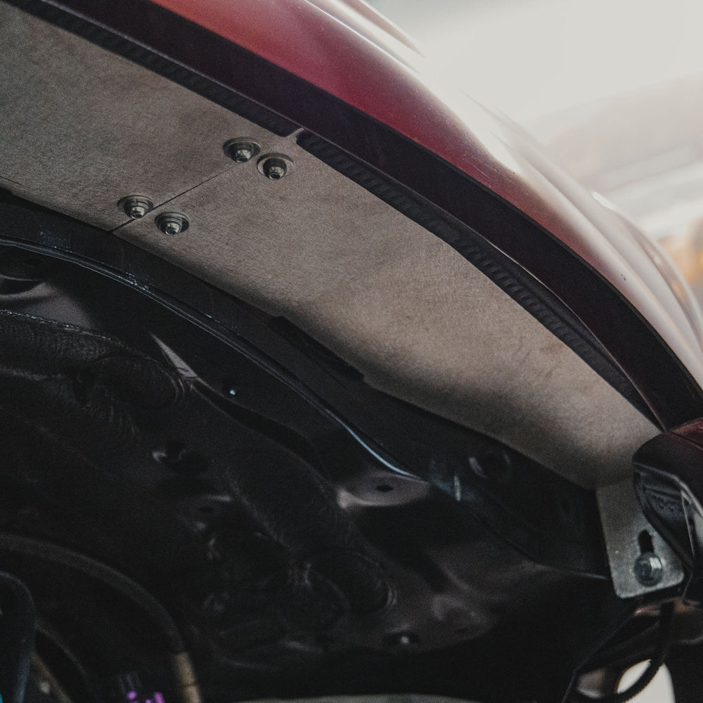 View from below of the passenger side High Clearance Fender Liner.
