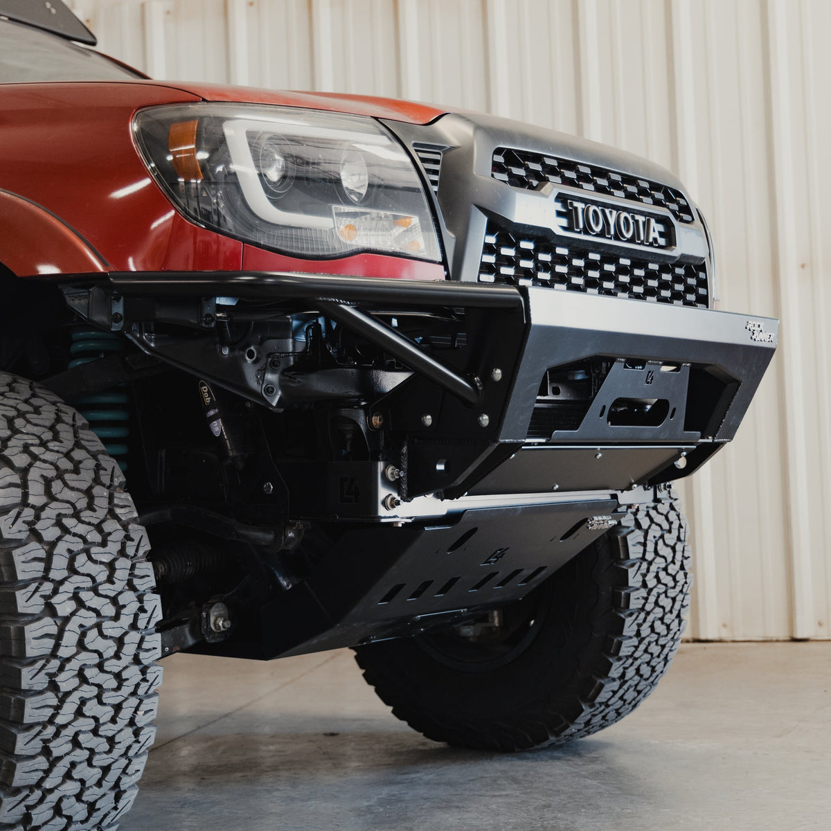 Cover photo for the C4 Rock Runner front skid plate with the background faded out and emphasis added to the skid plate.