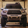 Straight front view of the C4 Hybrid bumper in raw steel like it ships to all customers.