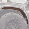 Cover photo for the C4 High Clearance Fender Liner kit for the 3rd Gen Tacoma with the liners emphasized and the rest of the photo faded out.