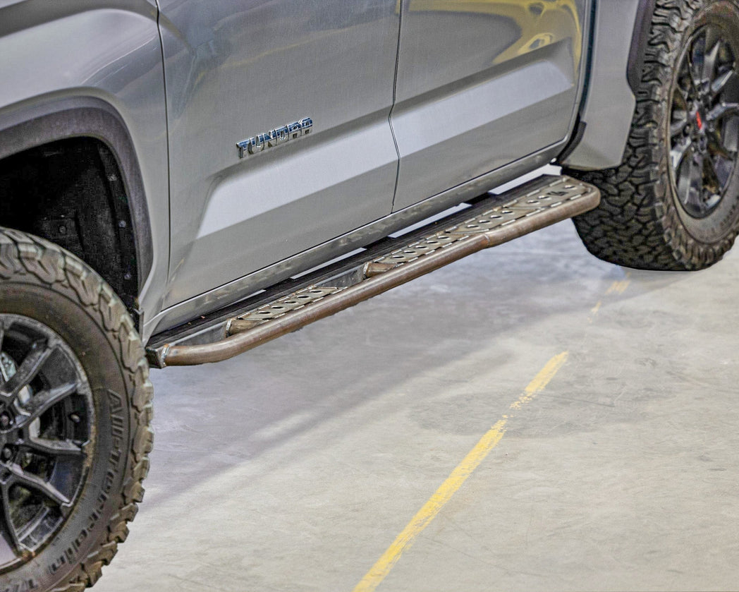 Cover photo of the C4 Sliders for the 3rd Generation Tundra with the background faded out and the sliders and truck emphasized. 