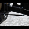 Close-up view showing the gas strut on the C4 swing-out bumper.