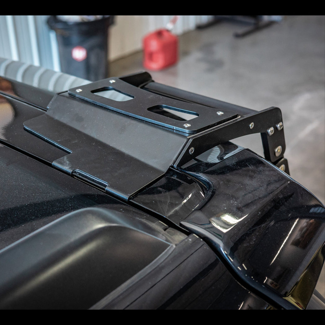 Front view of the top mounting method for the Summit hatch ladder as well as its top landing pad step. 