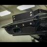 Second view of the bottom mounting method for the C4 Summit hatch ladder, showing the three bolts securing it to the bottom of the hatch. 