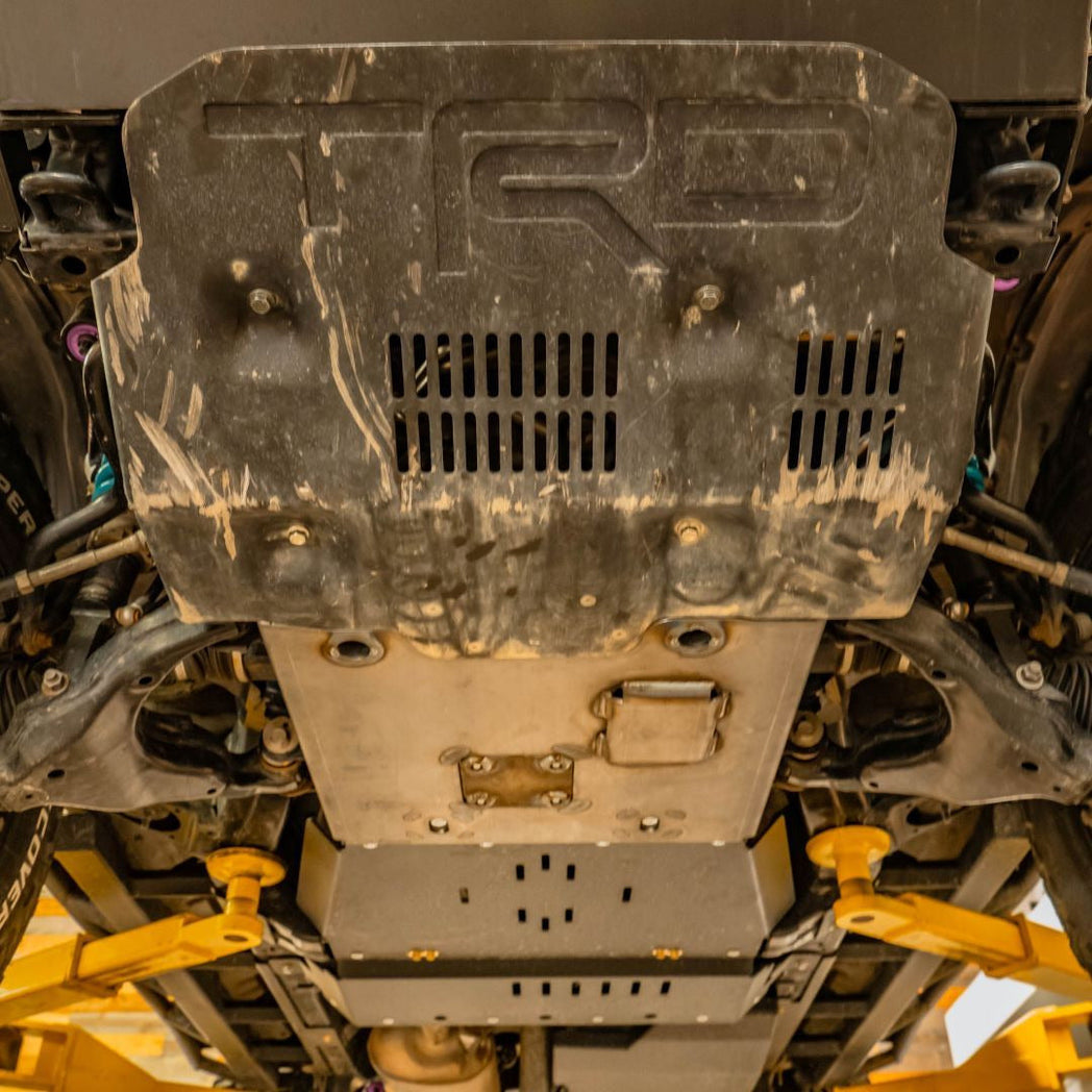 View from below of the TRD Pro skid plate amended with C4's Integration Skid Plate that provides coverage all the way to the back of the engine.
