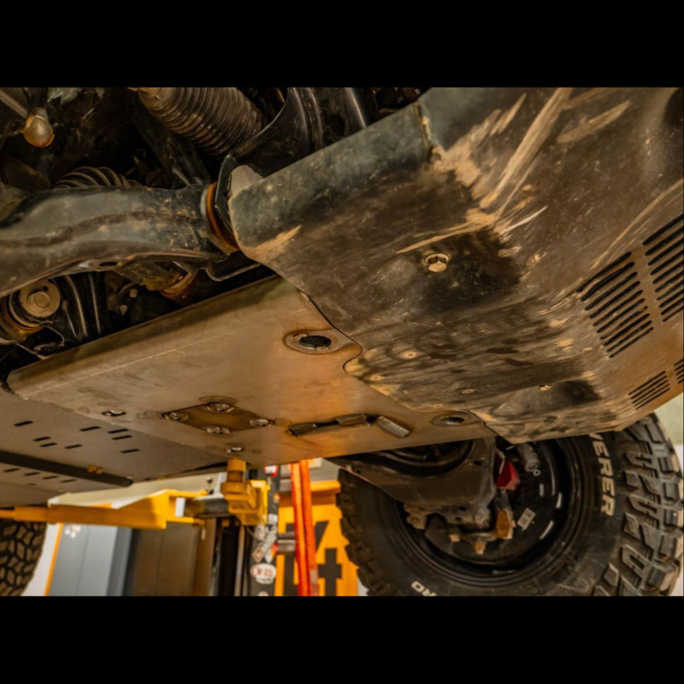 Side view of the TRD Pro skid when amended by the C4 Fabrications Integration Skid Plate.