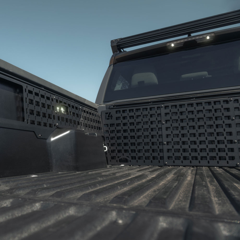 4th Gen Tacoma Bed Cab Storage Panels installed with factory hardware