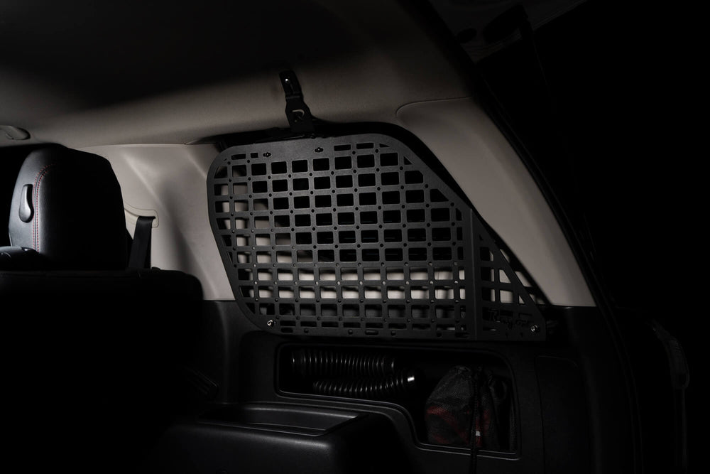5th Gen 4Runner Molle Panel Installed on rear window. Lighting highlights the molle panel.