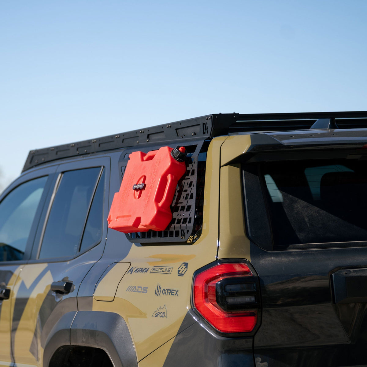 Rear view of 6th Gen 4Runner Exterior MOLLE Panel with RotopaX mounted to it.