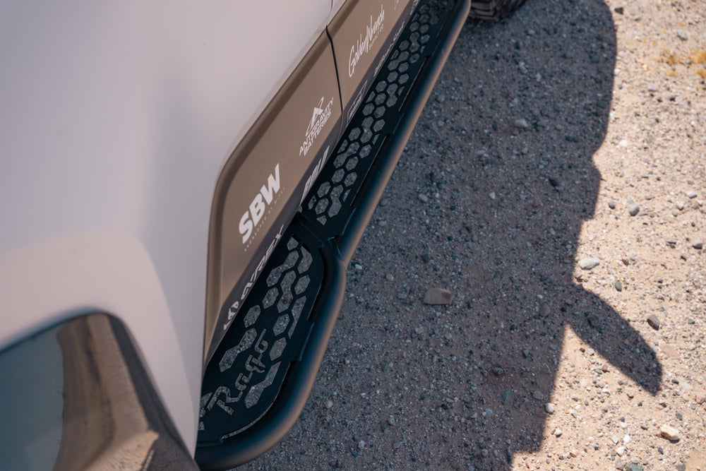 Honeycomb pattern of the 6th Gen 4Runner Rock Slider Side Steps by Rago matches the Toyota grille style.