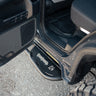 Rock sliders for the 6th Gen Toyota 4Runner viewed with the rear door open.