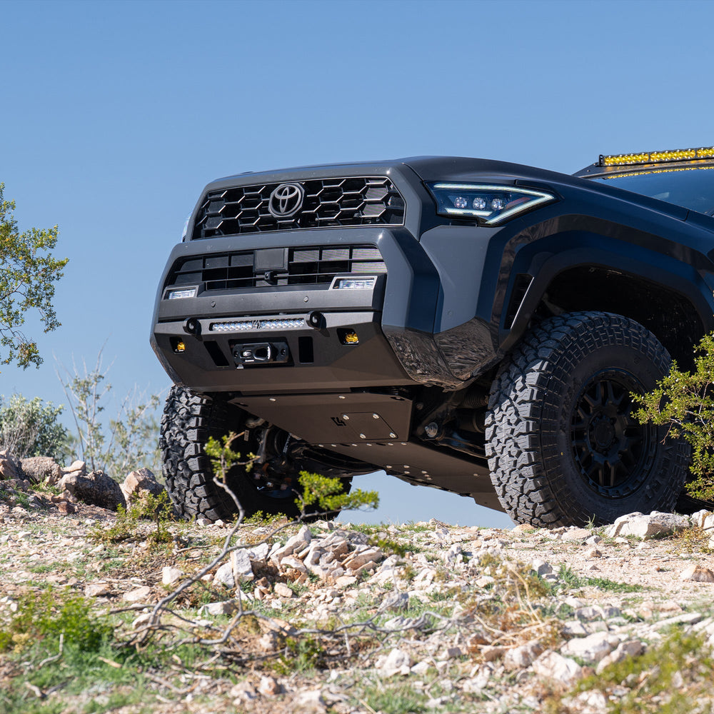 C4 Front Skid Plate for the 6th Gen 4Runner, visible as it crests a hill.