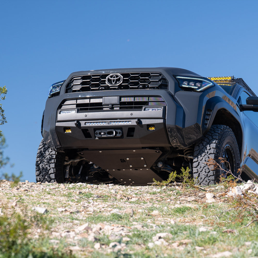 C4 Front Skid Plate for the 6th Gen 4Runner as the 4Runner summits a hill.