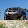 C4 Front Skid Plate for the 6th Gen 4Runner as the 4Runner summits a hill.