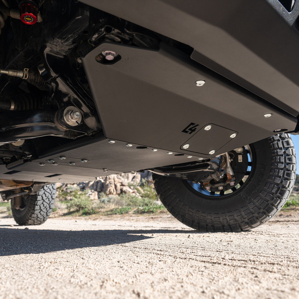 C4 Skid Plates for the 6th Gen 4Runner shot on dirt road.