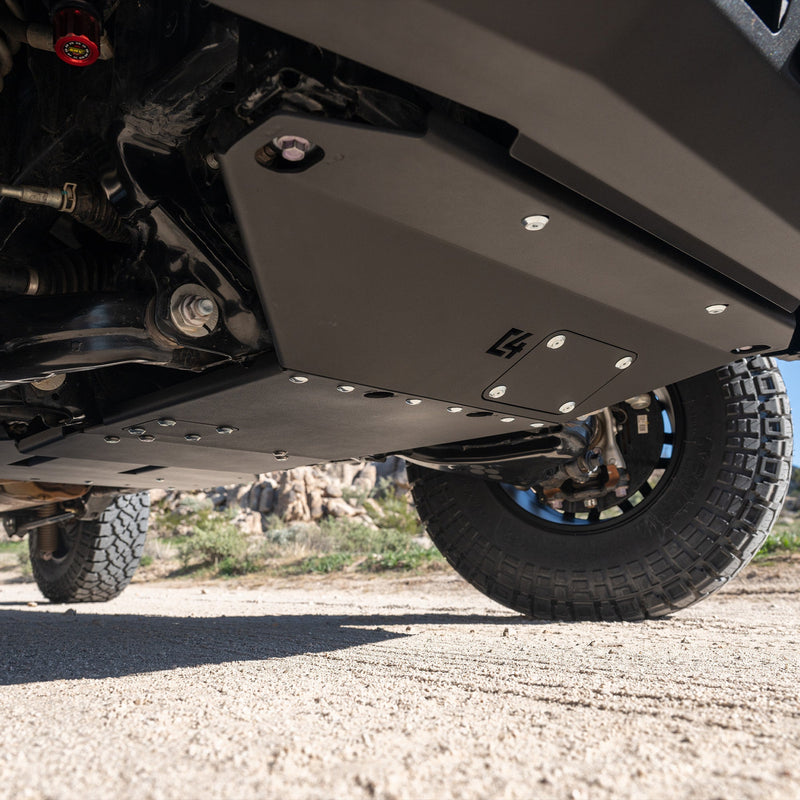 C4 Skid Plates for the 6th Gen 4Runner shot on dirt road.