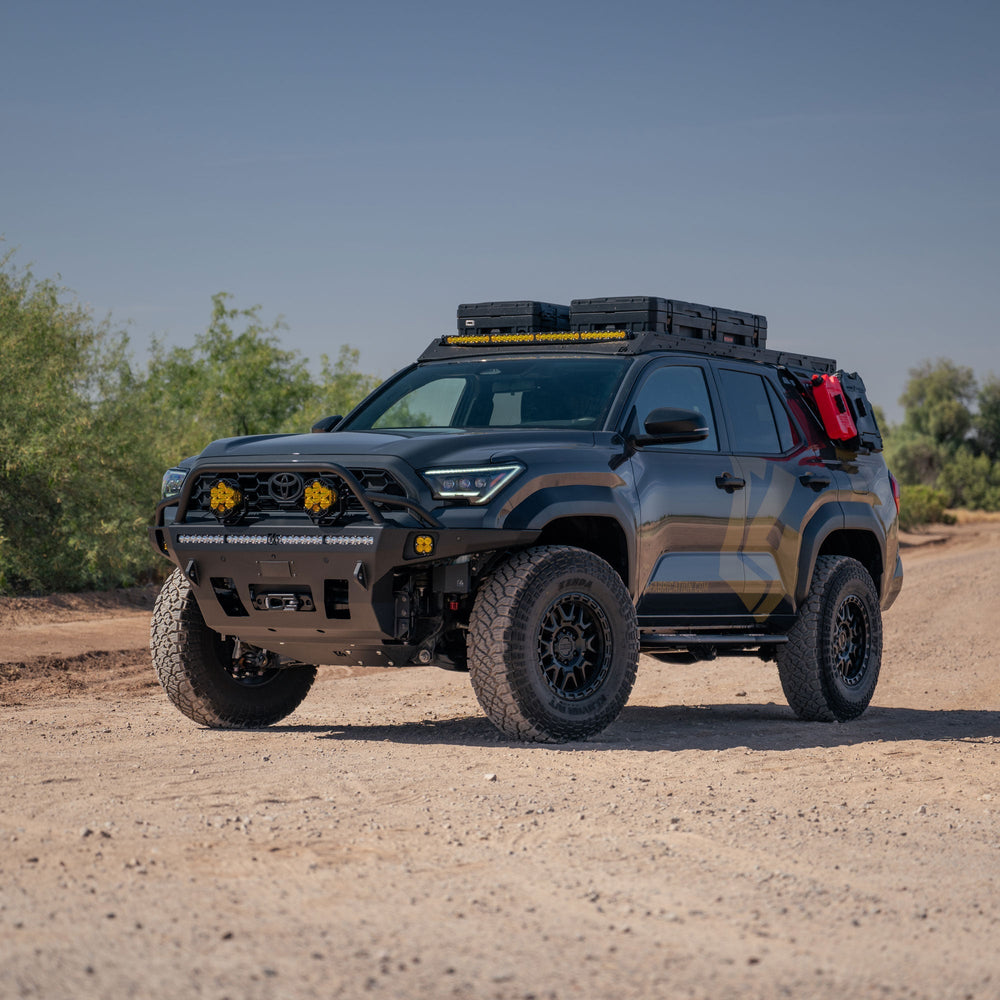 Fully built-out 6th gen 4Runner with C4 Fabrication Overland Series Front Bumper, Roof Rack, Sliders, Molle Panels, and skid plates.