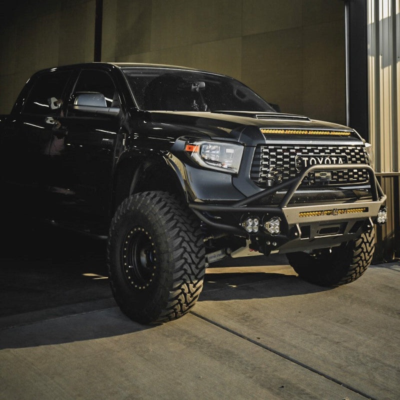 Quartering on photo of the C4 Hybrid bumper for the 2014+ Tundra installed on a black Crew Max. 