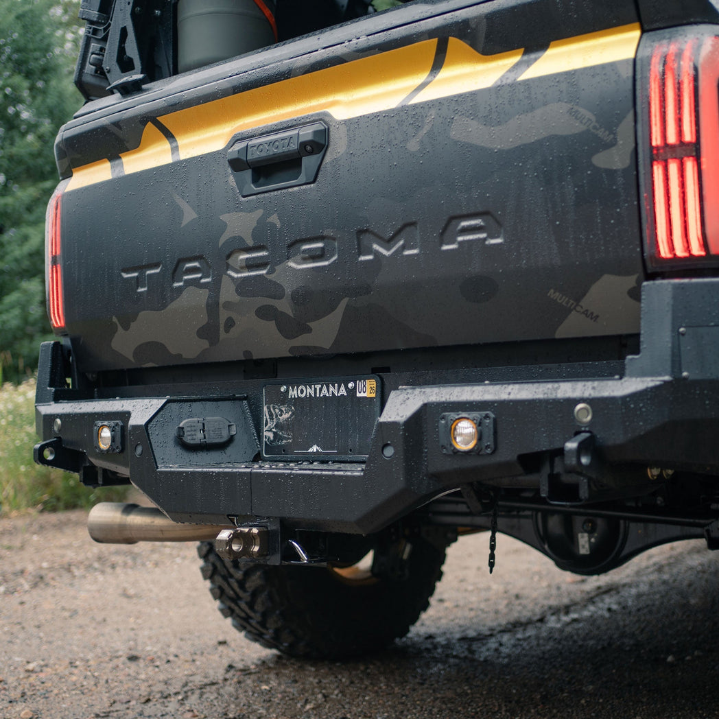 Close up showing a Baja Designs flush S2 installed in the accessory slot included on the C4 Overland rear bumper.