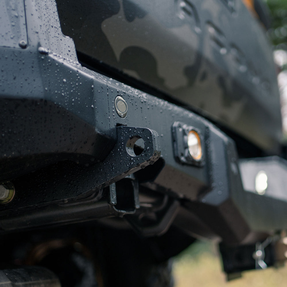 Low angle view showing the thick tow points included in the C4 Overland bumper for Tacomas.