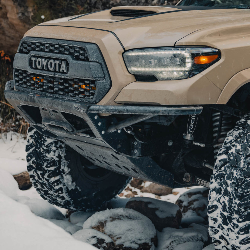 Quartering side view of the 3rd Gen Tacoma Rock Runner bumper from C4 Fabrication with the tube side option. 