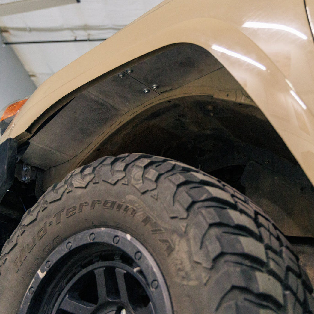 View up under the fender of a 5th Gen 4Runner to see the C4 High Clearance Fender Liners.