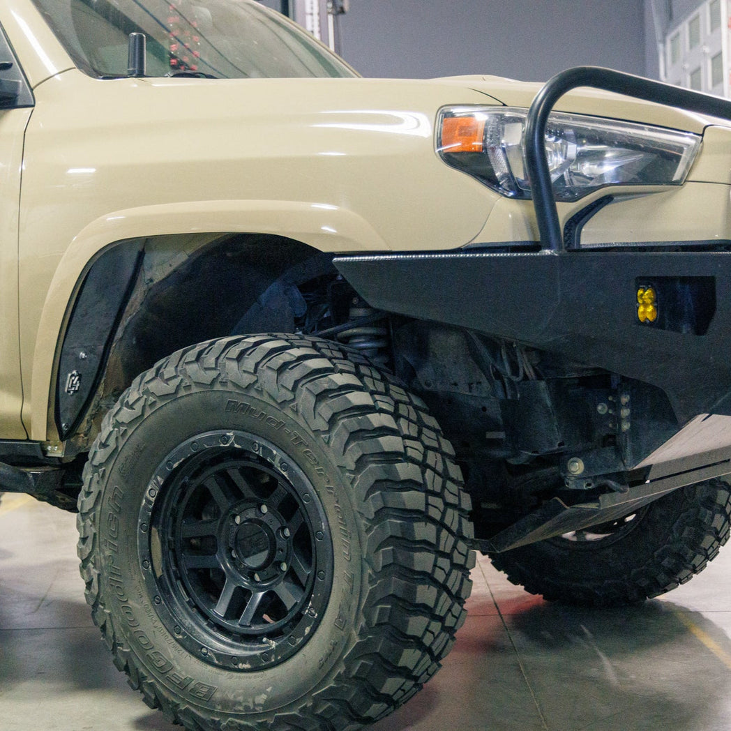 Quartering side view of a 5th Gen 4Runner with fender cuts and the C4 High Clearance Fender Liners kit.